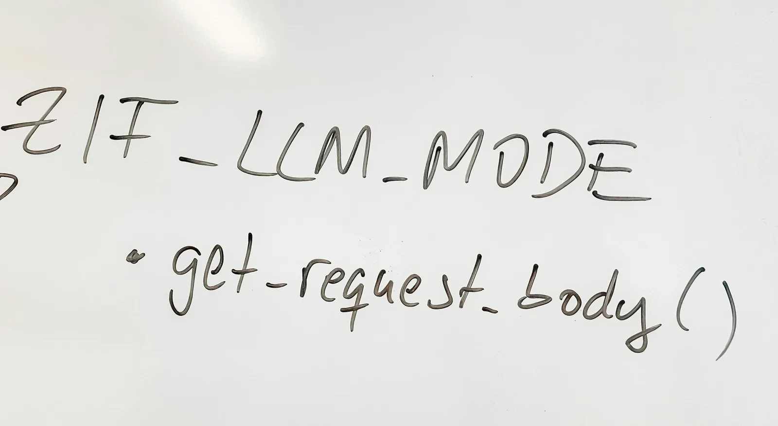 Technical whiteboard with handwritten code snippet, illustrating developer strategies for optimizing ranking in AI search discussed in this LLM Guide.