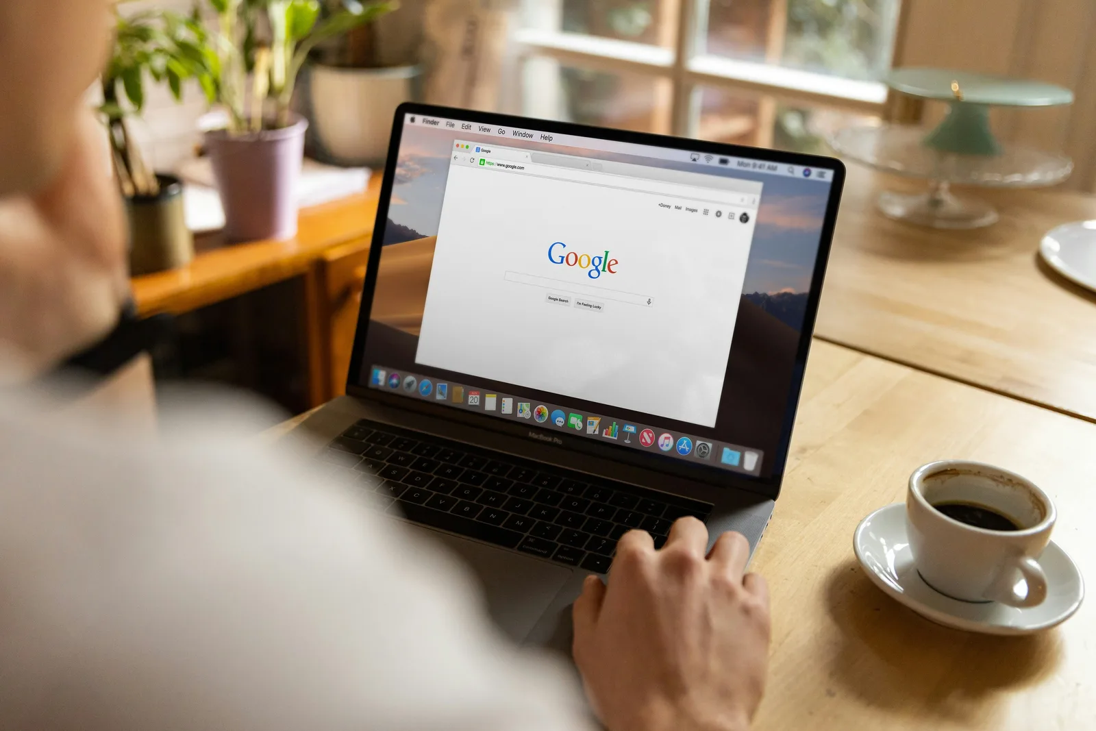 Marketer analysing Google search results on a laptop as organic traffic declines and businesses look to recover traffic lost to AI-powered search.